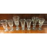 A collection of Antique etched and other drinking