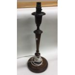 A large mahogany candlestick converted for electri