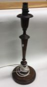 A large mahogany candlestick converted for electri