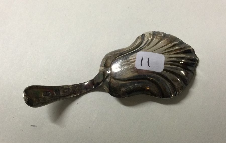 A George III chased silver caddy spoon. Chester. B - Bild 2 aus 2