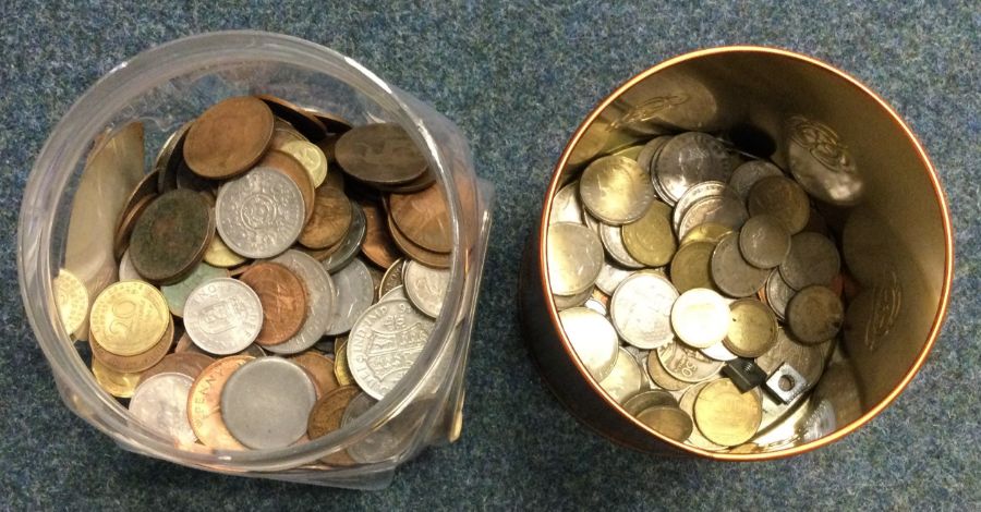 A box containing old coins etc. Est. £20 - £30.