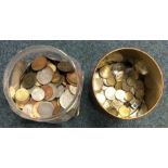 A box containing old coins etc. Est. £20 - £30.
