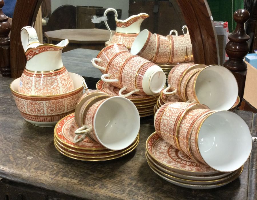 An attractive Mintons tea service decorated with g