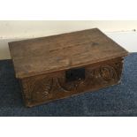 An old Georgian carved bible box. Est. £50 - £80.