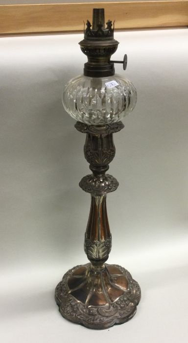 An Old Sheffield Plated oil lamp with glass reserv