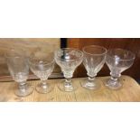 A group of five shaped Antique glass tumblers. Est