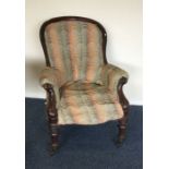 A Georgian mahogany spoon back chair on turned sup