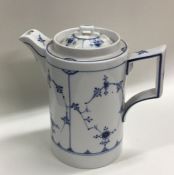 An Antique Chinese blue and white hot water jug. E