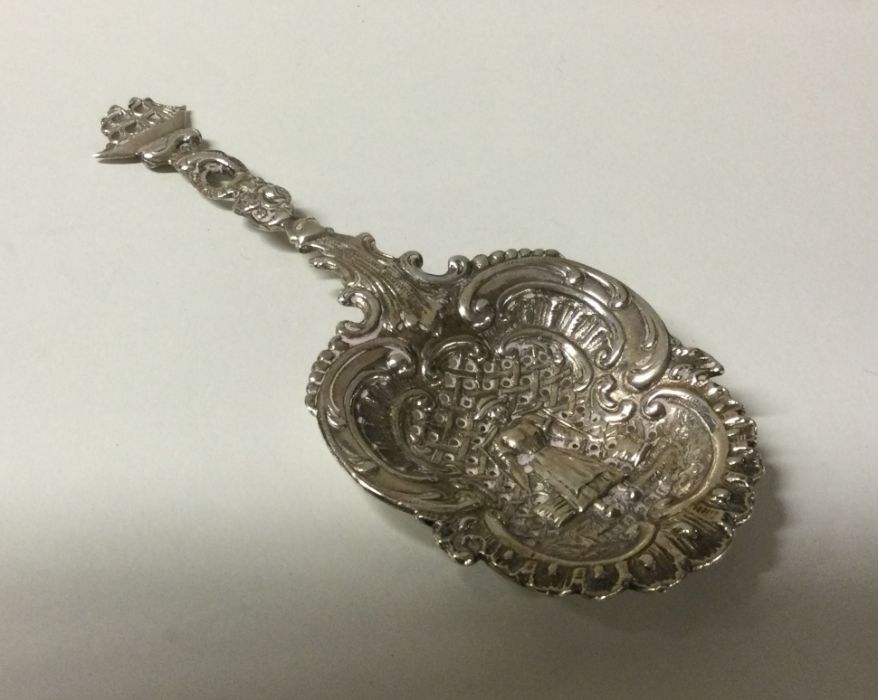 An attractive Continental silver spoon with chased