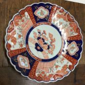 A large Chinese Imari wall charger decorated in br