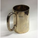 A heavy tapering silver mug. Birmingham. Approx. 3