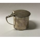 A circular Victorian silver mustard pot with gadro