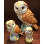 Three Beswick figures of owls of tapering forms. E