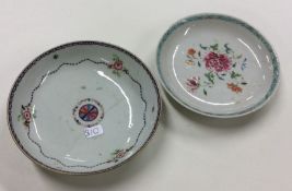 A Chinese Famille Rose saucer together with one ot