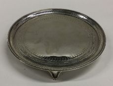 A George III silver salver of circular form. Londo