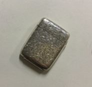 A large engraved hinged top silver vesta case. Bir