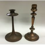 Two stylish brass candlesticks of tapering form. E