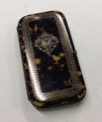 A gold inlaid and tortoiseshell hinged purse with