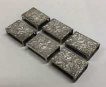 A good set of six embossed silver match holders pr