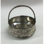 A Russian silver swing handled basket on tapering