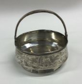 A Russian silver swing handled basket on tapering