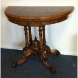 A good Victorian demi-lune card table with hinged