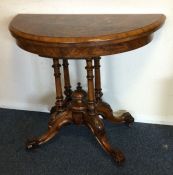 A good Victorian demi-lune card table with hinged