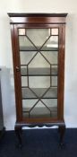 A good Edwardian mahogany display cabinet with bev