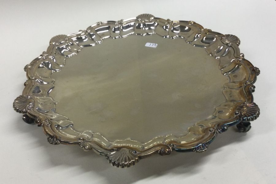 A circular silver salver. Birmingham. By FH. Appro - Image 2 of 2