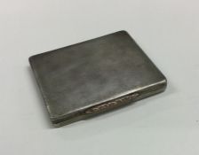 A silver engine turned cigarette box with hinged l