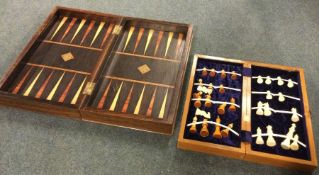 Two cased chess sets. Est. £30 - £40.