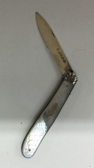 An oval Edwardian silver fruit knife with MOP deco