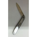 An oval Edwardian silver fruit knife with MOP deco