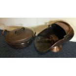 A large copper preserve pan and lid together with