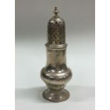 A Georgian silver sugar caster of baluster form. L