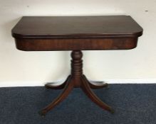 A good mahogany hinged top card table on four swee