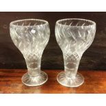 A pair of cut glass inverted baluster shaped vases