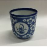 A good Chinese blue and white cup on pedestal foot