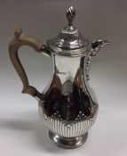 A Victorian silver half fluted coffee pot with bea