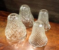 A group of four cut glass lampshades. Est. £10 - £