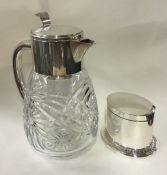 A large silver plated lemonade jug together with a