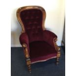 A Victorian spoon back nursing chair on turned sup