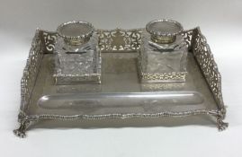 An attractive Victorian silver double inkstand wit