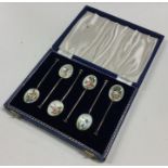 An attractive set of six silver and enamelled spoo