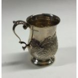 An Edwardian silver chased christening mug. Birmin