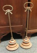 A good pair of brass door stops with ropetwist dec