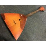 An old balalaika. Est. £30 - £50.