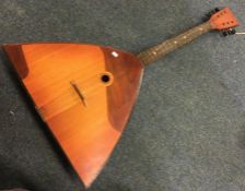 An old balalaika. Est. £30 - £50.