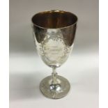 A large Victorian silver goblet attractively decor