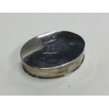 A large oval Georgian silver snuff box with engrav